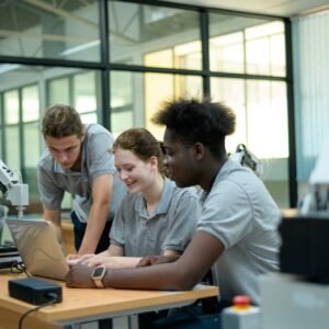 Trainee Robotics engineer learning with Programming Robot Hand